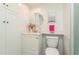 Clean bathroom with a toilet and vanity at 244 Saint Augustine Ave # 107, Venice, FL 34285