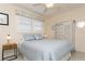 Bedroom with a queen bed and built-in wardrobe at 244 Saint Augustine Ave # 107, Venice, FL 34285