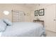 Main bedroom with a queen-size bed and dresser at 244 Saint Augustine Ave # 107, Venice, FL 34285