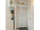 Bright entryway with built-in storage and coat rack at 244 Saint Augustine Ave # 107, Venice, FL 34285
