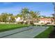 Community shuffleboard court with green surface at 244 Saint Augustine Ave # 107, Venice, FL 34285