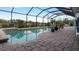 Inviting screened pool area with ample deck space at 2714 Lake View Blvd, Port Charlotte, FL 33948