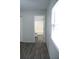 Clean bathroom with tub shower combo and wood-look floors at 3110 Siesta Dr, Venice, FL 34293