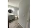 Bathroom with vanity, toilet, and tub shower combo at 3110 Siesta Dr, Venice, FL 34293