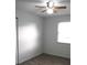 Bright bedroom with wood-look floors and a window at 3110 Siesta Dr, Venice, FL 34293