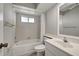 Clean bathroom with tub, toilet and vanity at 3117 Heron Shores Dr, Venice, FL 34293