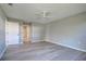 Spacious bedroom featuring light gray walls and wood-look floors at 3117 Heron Shores Dr, Venice, FL 34293