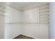 Large walk-in closet with wire shelving provides ample storage at 3117 Heron Shores Dr, Venice, FL 34293