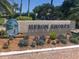Heron Shores community entrance sign with landscaping at 3117 Heron Shores Dr, Venice, FL 34293