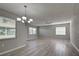 Dining room with light gray walls and wood-look floors at 3117 Heron Shores Dr, Venice, FL 34293