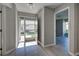 Light and bright entryway with wood-look floors at 3117 Heron Shores Dr, Venice, FL 34293