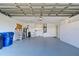 Large garage with workshop area and storage cabinets at 3117 Heron Shores Dr, Venice, FL 34293