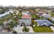 Aerial view of a single Gathering home with circular driveway, situated in a residential neighborhood at 315 Park N Blvd, Venice, FL 34285