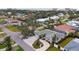 Aerial view showcasing a single-Gathering home and its surroundings, including neighboring houses and streets at 315 Park N Blvd, Venice, FL 34285