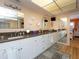 Bathroom with double vanity, granite countertop and large mirror at 315 Park N Blvd, Venice, FL 34285