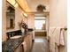 Elegant bathroom with granite countertop and large tub at 315 Park N Blvd, Venice, FL 34285