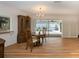 Bright dining room with sliding glass doors leading to the pool area at 315 Park N Blvd, Venice, FL 34285