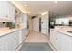 Spacious kitchen with white cabinets and stainless steel appliances at 315 Park N Blvd, Venice, FL 34285
