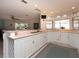 Modern kitchen with white cabinets and granite countertops at 315 Park N Blvd, Venice, FL 34285