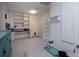 Laundry room with built-in shelving and storage at 315 Park N Blvd, Venice, FL 34285