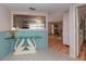 Glass-top console table and swan-shaped base in a living room at 315 Park N Blvd, Venice, FL 34285