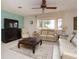 Relaxing living room, featuring a large TV and comfortable seating at 315 Park N Blvd, Venice, FL 34285