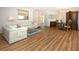 Open floor plan with living and dining areas and wood floors at 315 Park N Blvd, Venice, FL 34285