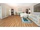 Spacious living room with floral sofas and wood flooring at 315 Park N Blvd, Venice, FL 34285