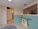 Living room with glass-top console table and swan-shaped base at 315 Park N Blvd, Venice, FL 34285