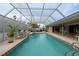Inviting screened pool with a spa and plenty of space for lounging at 315 Park N Blvd, Venice, FL 34285