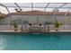 Relaxing pool area with a fountain and lush landscaping at 315 Park N Blvd, Venice, FL 34285