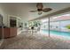 Covered patio with seating area overlooking the pool at 315 Park N Blvd, Venice, FL 34285