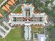 Aerial view of condo building, pool, and parking lot at 3730 Cadbury Cir # 300, Venice, FL 34293