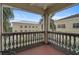 Screened balcony with ornate railings and views of the community at 3730 Cadbury Cir # 300, Venice, FL 34293