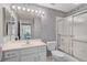 Clean bathroom with shower/tub combo and floral border at 3730 Cadbury Cir # 300, Venice, FL 34293