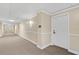 Clean hallway with carpeted floors and neutral wall colors at 3730 Cadbury Cir # 300, Venice, FL 34293