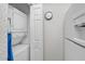 Stackable washer and dryer in a compact laundry closet at 3730 Cadbury Cir # 300, Venice, FL 34293