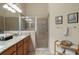 Elegant bathroom with granite countertop and walk-in shower at 3789 Lakewood Blvd, North Port, FL 34287