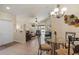 Casual dining area with glass-top table and four chairs at 3789 Lakewood Blvd, North Port, FL 34287