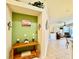 Inviting entryway with decorative console table and accent wall at 3789 Lakewood Blvd, North Port, FL 34287