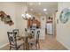 Eat-in kitchen with granite countertops and wood cabinets at 3789 Lakewood Blvd, North Port, FL 34287