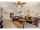 Open living room showcasing comfortable furniture and natural light at 3789 Lakewood Blvd, North Port, FL 34287