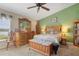 Spacious main bedroom with ample light and built-in wooden furniture at 3789 Lakewood Blvd, North Port, FL 34287