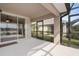 Screened patio with sliding door access to interior at 3789 Lakewood Blvd, North Port, FL 34287