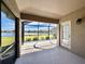 Spacious screened patio with lake view, perfect for outdoor relaxation at 3789 Lakewood Blvd, North Port, FL 34287