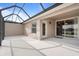 Relaxing screened patio with access to interior at 3789 Lakewood Blvd, North Port, FL 34287