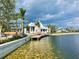Upscale community with a waterfront view and modern buildings at 3789 Lakewood Blvd, North Port, FL 34287