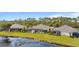 Three homes with screened lanais overlooking the lake at 3789 Lakewood Blvd, North Port, FL 34287