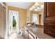 This bathroom showcases granite countertops, wooden cabinets, and outdoor access at 38 Riverfront Dr, Venice, FL 34293
