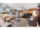 Cozy living room showcasing a fireplace and unique decorative artwork at 38 Riverfront Dr, Venice, FL 34293